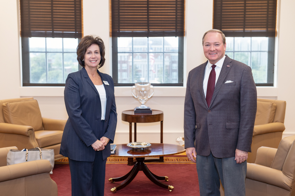 Mary Graham, president of Mississippi Gulf Coast Community College, poses for a photo with President Keenum in the Presidential 